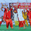 Students of Indo Global Colleges performing at stage on annual day