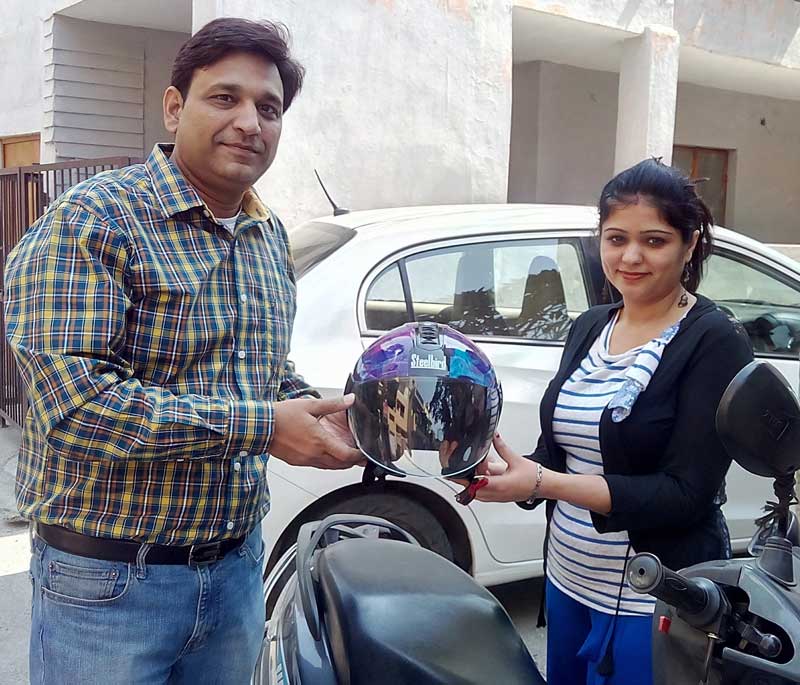 Steelbird distributed Women Helmets on the International Women’s Day