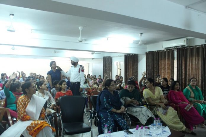 Chandigarh Traffic Police educates women students of Dev Samaj on wearing Helmet