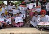 AAP gheraoes Lambi police station demanding arrest of culprits in spurious liquor factory busted at Badal village