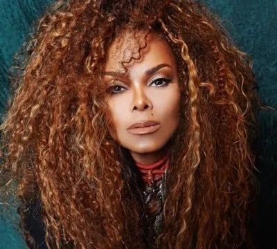 Janet Jackson slides her hand in male dancer’s pants in sensual act during tour