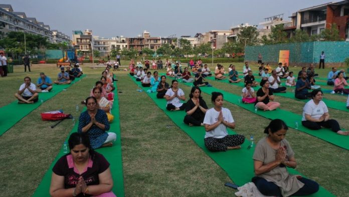 Wave Estate organises yoga sessions to commemorate the 9th International Yoga Day