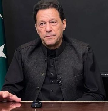 Imran being served chicken