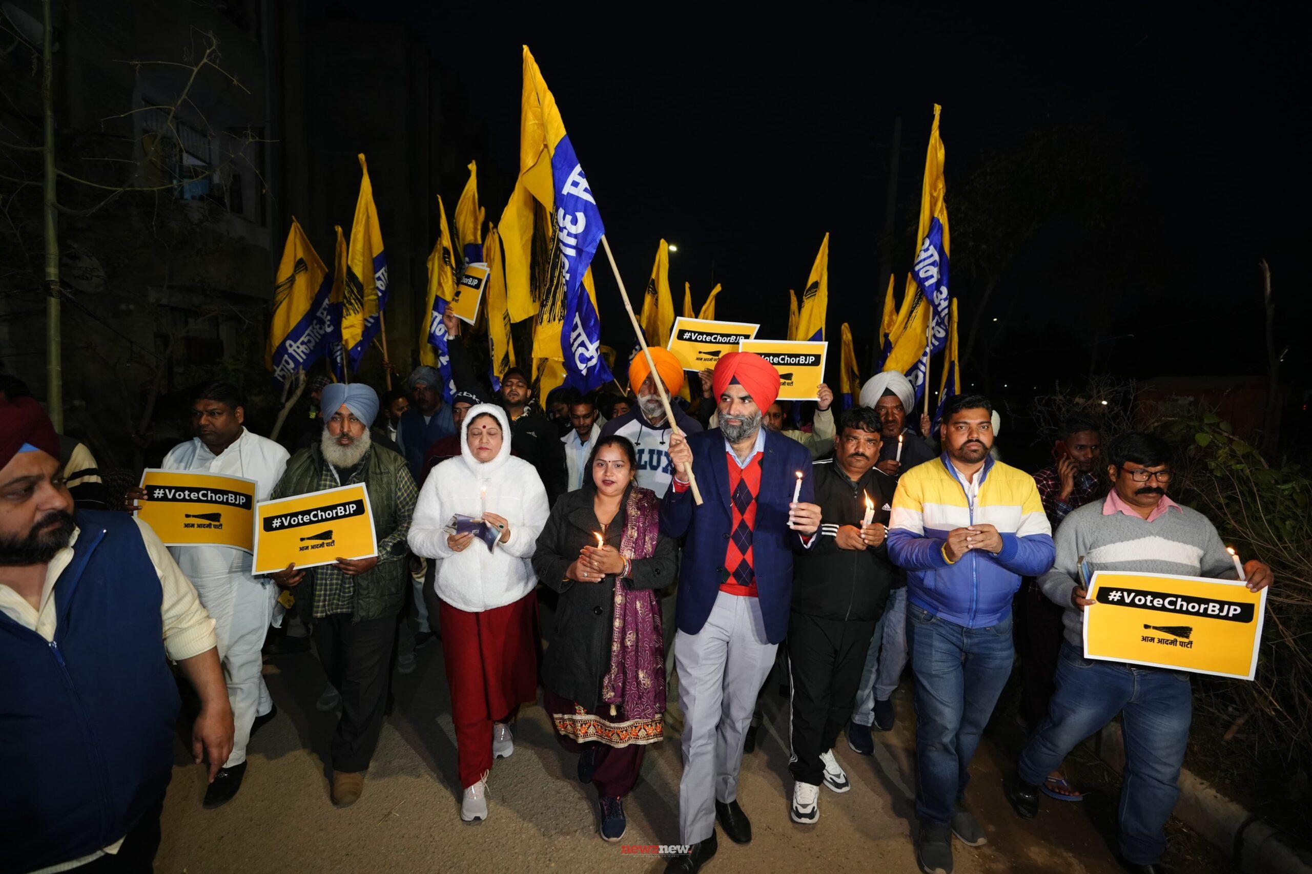 Aam Aadmi Party holds a candle march against rigging in Chandigarh Mayoral election