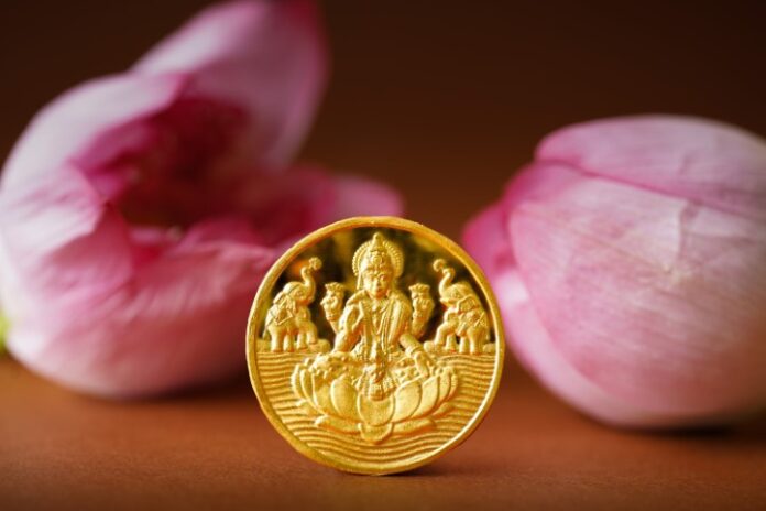 Nek Unveils Pure 24KT Gold Coin for Varamahalakshmi Pooja