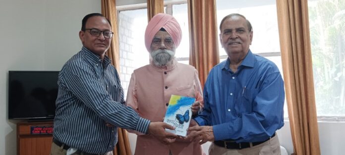 Writer Prem Vij and Dr. Vinod Sharma presented Kavya Triveni to Chancellor Padmashri Bedi